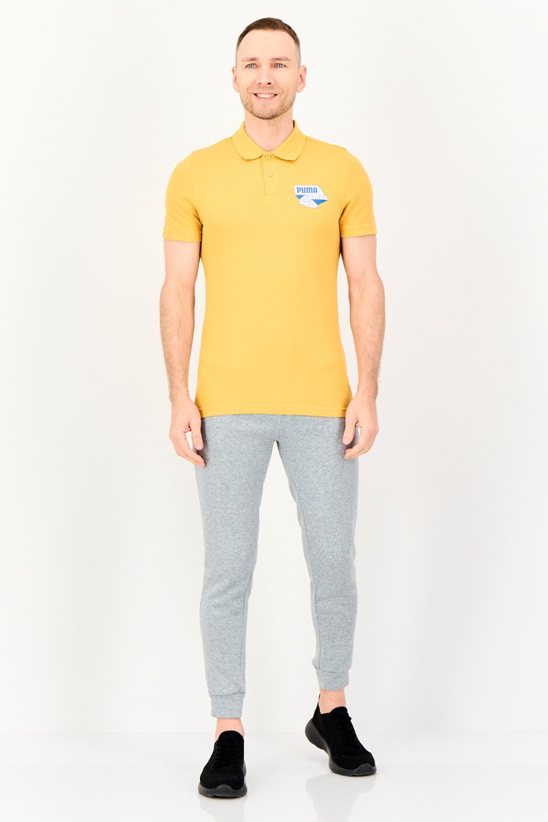 PUMA Men Slim Fit Short Sleeve Outdoor Polo Shirt, Mustard Yellow - Image 2